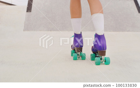 Park, hobby and legs of a woman rollerskating for fitness, training and sport on the ground. Exercise, practice and feet of a girl doing cardio to skate for urban sports, learning and activity Park, hobby and legs of a woman rollerskating for fitness, training and sport on the ground. Exercise, practice and feet of a girl doing cardio to skate for urban sports, learning and activity 100133830