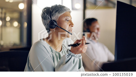 Senior call center employee, woman and phone call, CRM and face, contact us and talking with client and pen. Customer service, telemarketing or tech support, communication and consultant with headset 100135019