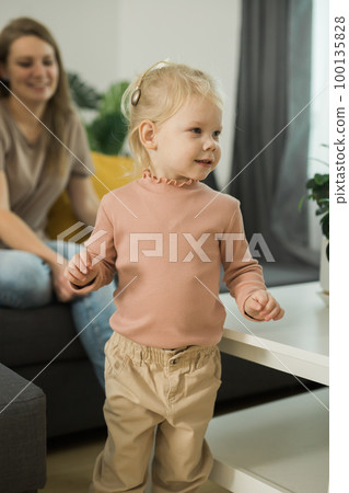 Deaf child girl with cochlear implant studying to hear sounds - recovery after cochlear Implant surgery and rehabilitation concept Deaf child girl with cochlear implant studying to hear sounds - recovery after cochlear Implant surgery and rehabilitation concept 100135828