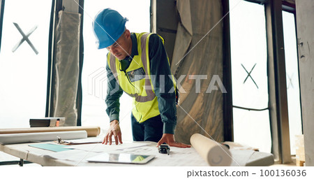 Man, architect or engineer and planning for inspection, construction or maintenance in safety and security on site. Male engineer, builder or contractor checking project plans for industrial architec 100136036