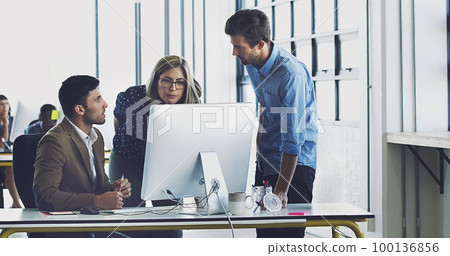 Collaboration, management and team working together on a web design at a startup company office using internet. Group, teamwork and business people using computer for developers of idea Collaboration, management and team working together on a web design at a startup company office using internet. Group, teamwork and business people using computer for developers of idea 100136856