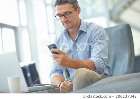 Phone, business man or corporate travel for investment strategy, finance growth or financial review. CEO, airport lobby or manager on smartphone for planning, data analysis or economy invest research 100137342