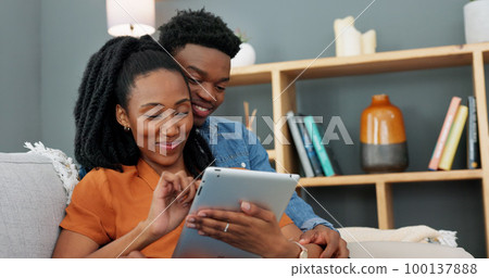Black couple, tablet and happy man and woman browsing the internet, doing online shopping or enjoying streaming service subscription. Lovers enjoying social media mobile app with 5g home wifi network Black couple, tablet and happy man and woman browsing the internet, doing online shopping or enjoying streaming service subscription. Lovers enjoying social media mobile app with 5g home wifi network 100137888