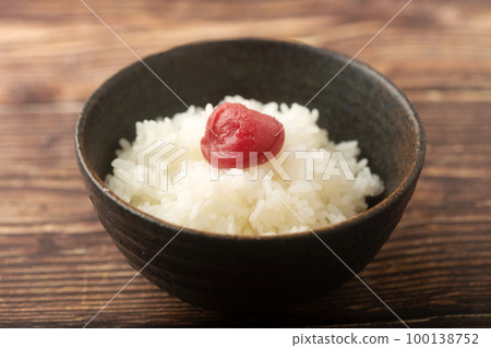 rice topped with pickled plum rice topped with pickled plum 100138752