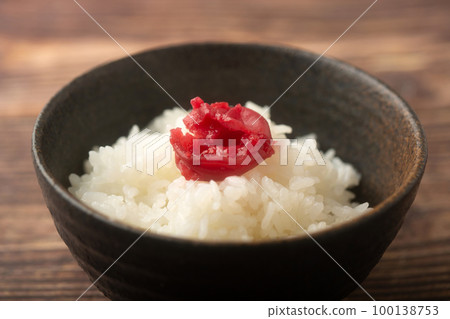 rice topped with pickled plum rice topped with pickled plum 100138753
