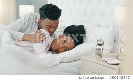 Couple in bedroom after fight, frustrated black woman and man comfort young angry girl. Home together, sad argument and ignore relationship problem. Stress from mistake, risk divorce or breakup 100140807