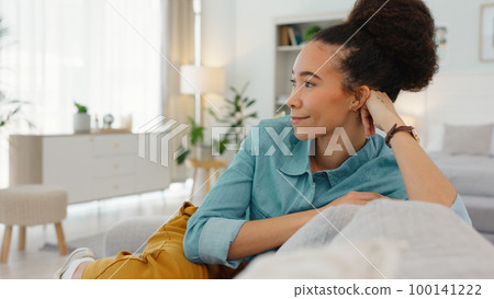 Black woman, relaxing by home office in morning start for freelancing business at home. African American female freelancer relaxing in the bedroom with positive mindset with freedom. Black woman, relaxing by home office in morning start for freelancing business at home. African American female freelancer relaxing in the bedroom with positive mindset with freedom. 100141222