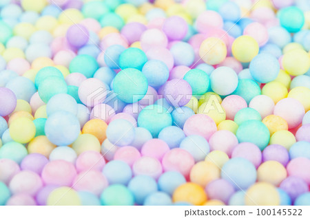 The Foam beads of various colors brightly colored abstract background. The Foam beads of various colors brightly colored abstract background. 100145522