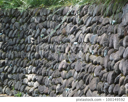 Scenery of beautifully stacked stone walls 100149592