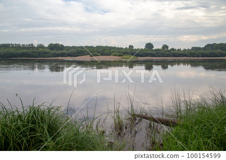 Image of the river from coast in cloudy day Image of the river from coast in cloudy day 100154599