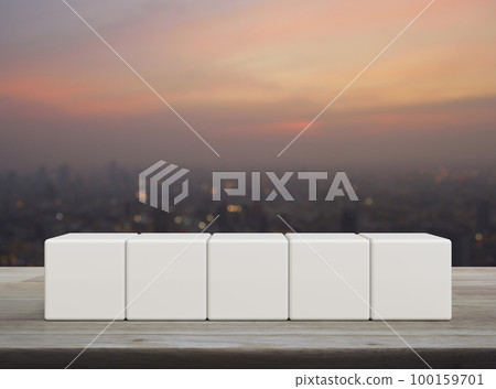 Five white block cubes on wooden table Five white block cubes on wooden table 100159701