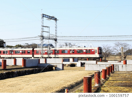 A train on the Kintetsu Nara Line running past the restored ruins of the Heijo Palace, a World Heritage Site A train on the Kintetsu Nara Line running past the restored ruins of the Heijo Palace, a World Heritage Site 100159757