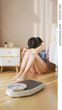 woman depressed for loss weight 100161361