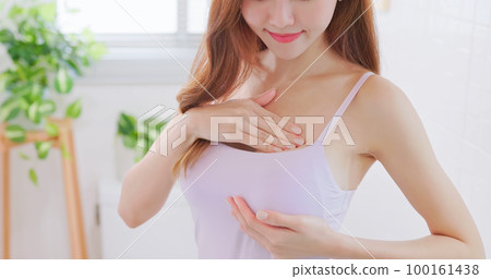 Breast cancer self check concept Breast cancer self check concept 100161438