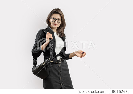 Woman with Leather Shoulder Bag with Braided Strap Woman with Leather Shoulder Bag with Braided Strap 100162623