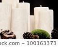 A set of natural ecological palm wax candles - crystalline texture on the surface 100163373