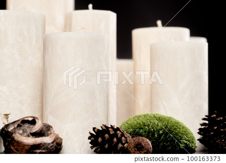 A set of natural ecological palm wax candles - crystalline texture on the surface 100163373