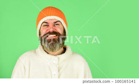 Lets celebrate. cold and flu. Portrait of brutal man in fleece sweatshirt. Handsome male model wearing warm hat. casual man in winter hat and warm clothes. happy hipster wear warm hat. copy space Lets celebrate. cold and flu. Portrait of brutal man in fleece sweatshirt. Handsome male model wearing warm hat. casual man in winter hat and warm clothes. happy hipster wear warm hat. copy space 100165141