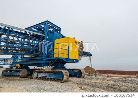 Industrial belt conveyor moving raw materials from mine 100167534