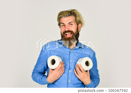 Ready for any event. toilet paper shortage in coronavirus panic. fear of pandemic outbreak closing shopping stores. man hold tissue in toilet. bearded man hold toilet paper. guy suffer from diarrhea Ready for any event. toilet paper shortage in coronavirus panic. fear of pandemic outbreak closing shopping stores. man hold tissue in toilet. bearded man hold toilet paper. guy suffer from diarrhea 100167592