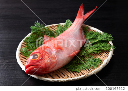 Alfonsino on a colander 100167612