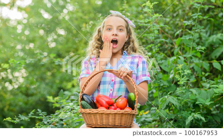 oh my god. healthy food for children. surprised little farmer. autumn harvest. harvest vitamin. spring market garden. little girl vegetable in basket. Only natural. kid on summer farm. Organic food 100167953
