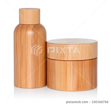Wooden cosmetic dropper bottle and jar isolated white background 100168788
