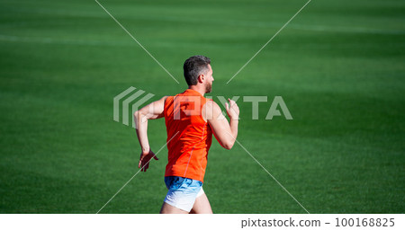 Never stop. marathon speed. sport athlete run fast to win. successful fitness sprinter. male coach on stadium running track. endurance and stamina. runner on racetrack. challenge and competition 100168825