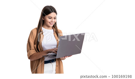 school girl use laptop for education, copy space. teen girl with pc for school education in studio. school girl use laptop for education, copy space. teen girl with pc for school education in studio. 100169198