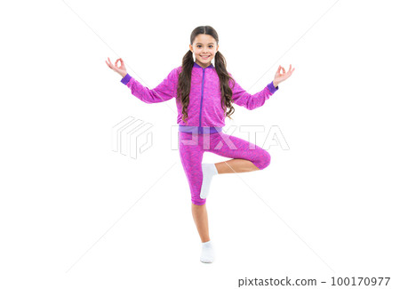 happy teen yoga girl meditating on background. photo of teen yoga girl meditating in sportswear. happy teen yoga girl meditating on background. photo of teen yoga girl meditating in sportswear. 100170977