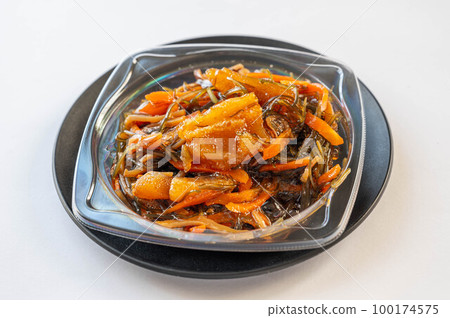 Matsumae pickles in a transparent container Matsumae pickles in a transparent container 100174575