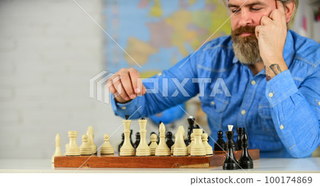 need regular exercises. teacher make training lesson. education concept. man playing intellectual game. clever man play chess. chess board with chess pieces. tournament strategy. Schoolboard fun 100174869