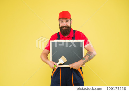 Successful engineer. Construction worker ready to work. brutal hipster craftsman advertisement. professional repairer wanted. builder man paint on blackboard. bearded worker with painting brush Successful engineer. Construction worker ready to work. brutal hipster craftsman advertisement. professional repairer wanted. builder man paint on blackboard. bearded worker with painting brush 100175238