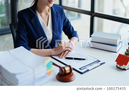 Law, Consultation, Agreement, Contract, Concept Attorney or Lawyer is sitting and accepting complaints from clients for home and land matters in court Law, Consultation, Agreement, Contract, Concept Attorney or Lawyer is sitting and accepting complaints from clients for home and land matters in court 100175435