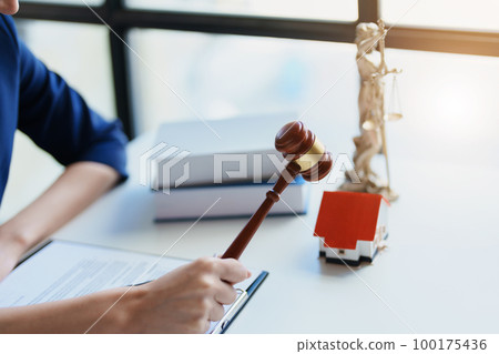 Law, Consultation, Agreement, Contract, Concept Attorney or Lawyer is sitting and accepting complaints from clients for home and land matters in court Law, Consultation, Agreement, Contract, Concept Attorney or Lawyer is sitting and accepting complaints from clients for home and land matters in court 100175436