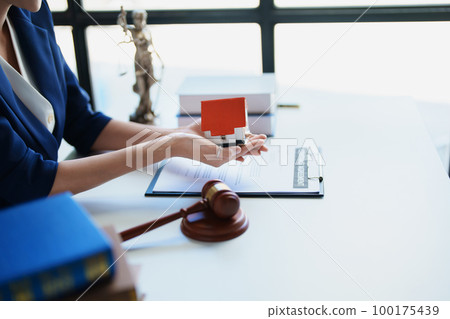 Law, Consultation, Agreement, Contract, Concept Attorney or Lawyer is sitting and accepting complaints from clients for home and land matters in court Law, Consultation, Agreement, Contract, Concept Attorney or Lawyer is sitting and accepting complaints from clients for home and land matters in court 100175439