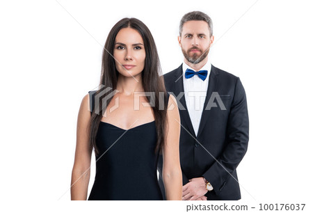 selective focus of formalwear couple on background. photo of formalwear couple wear tuxedo 100176037