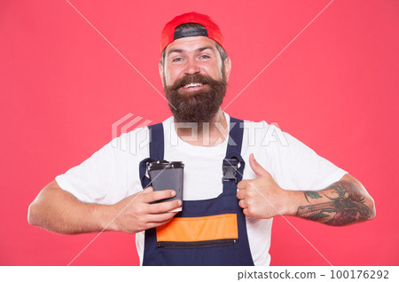 Mechanic enjoy coffee. Handsome builder hold coffee cup. Is Coffee Break the Best Part of Your Day. Coffee helps enhance productivity levels, increases focus, and lowers stress levels at work Mechanic enjoy coffee. Handsome builder hold coffee cup. Is Coffee Break the Best Part of Your Day. Coffee helps enhance productivity levels, increases focus, and lowers stress levels at work 100176292