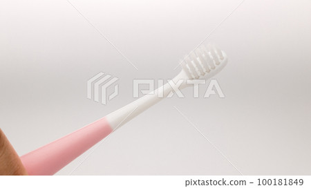 Toothbrush of baby health care. Toothbrush for young baby.  100181849