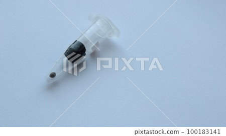 a plant seed packed in a plastic protective container for transportation and growing at home, a medical alternative plant seed in a transparent closed box lying on a light empty surface a plant seed packed in a plastic protective container for transportation and growing at home, a medical alternative plant seed in a transparent closed box lying on a light empty surface 100183141