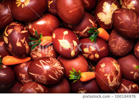 Traditional easter eggs dyed in onion peel. 100184976