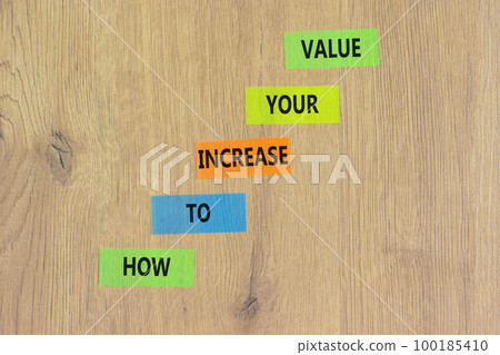 Increase your value symbol. Concept words How to increase your value on colored paper. Beautiful wooden table wooden background. Business how to increase your value concept. Copy space. Increase your value symbol. Concept words How to increase your value on colored paper. Beautiful wooden table wooden background. Business how to increase your value concept. Copy space. 100185410