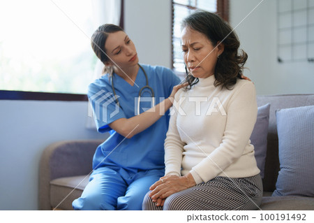 Portrait of a female doctor holding a patient's hand to encourage the fight against disease Portrait of a female doctor holding a patient's hand to encourage the fight against disease 100191492