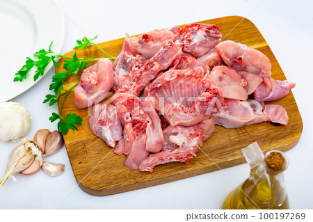 Raw rabbit meat with spices and herbs Raw rabbit meat with spices and herbs 100197269