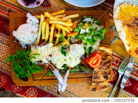 Grilled lamb ribs with cheese 100197556