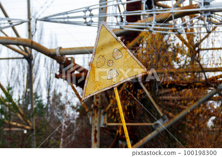 Radiation warning sign in front of Duga, a Soviet over-the-horizon (OTH) radar system as part of the Soviet anti-ballistic missile early-warning network, inside the Chernobyl Exclusion Zone in Ukraine Radiation warning sign in front of Duga, a Soviet over-the-horizon (OTH) radar system as part of the Soviet anti-ballistic missile early-warning network, inside the Chernobyl Exclusion Zone in Ukraine 100198300