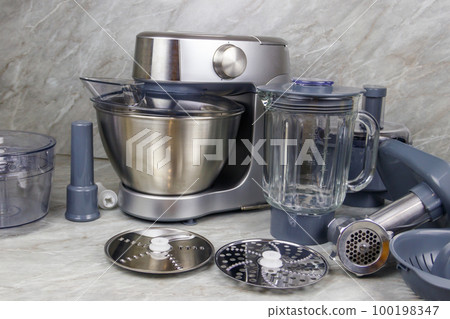Modern kitchen machine with different attachments and accessories Modern kitchen machine with different attachments and accessories 100198347