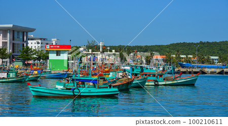 Fishing boats on the blue sea Fishing boats on the blue sea 100210611