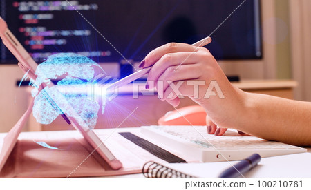 Woman programmer write down code Woman programmer write down code 100210781