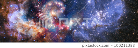 Colorful cosmos with stardust and milky way. Magic color galaxy. Infinite universe and starry night.Elements of this image furnished by NASA 100211388